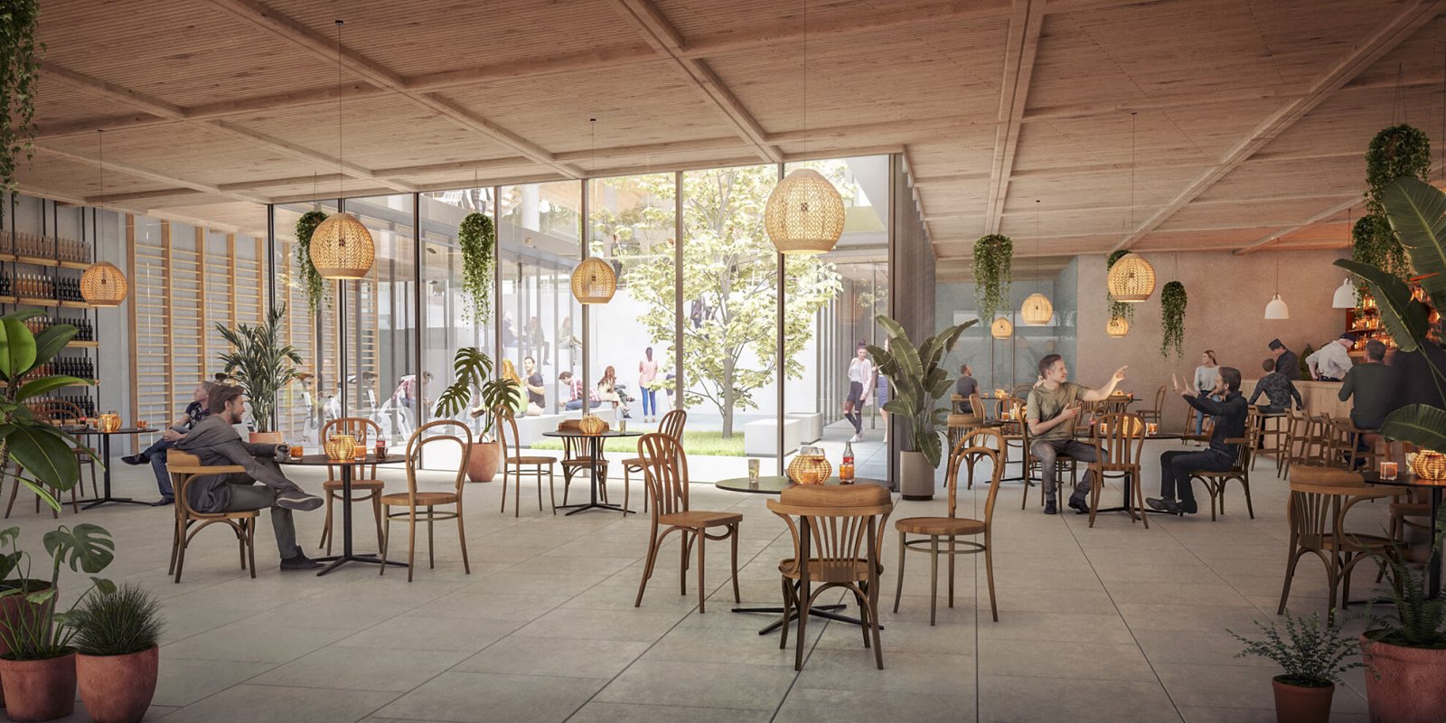 Interior rest area with tables, bar and view of an interior garden