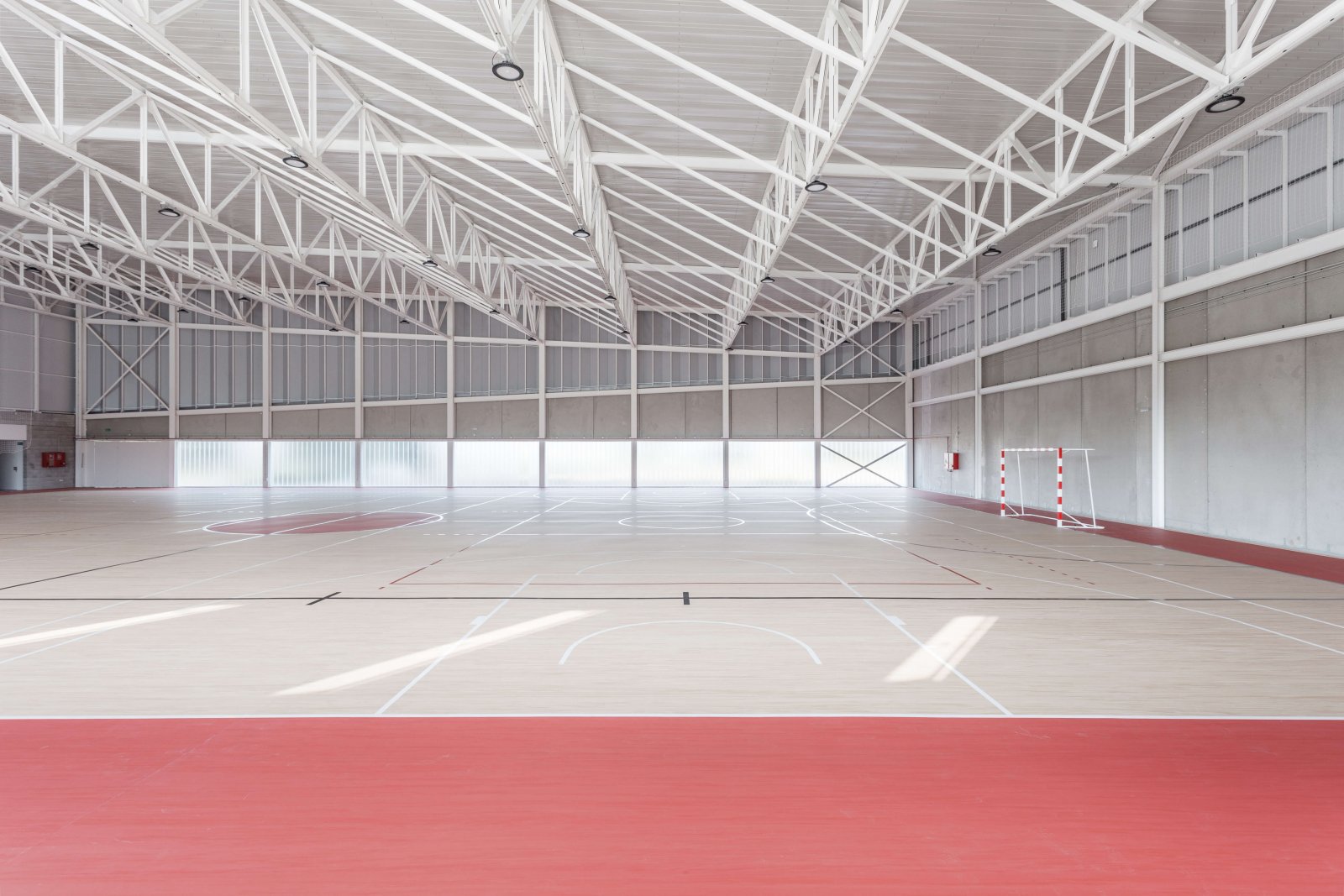 Another view of the sports court with parquet floors marked for basketball and football of the pavilion son ferragut