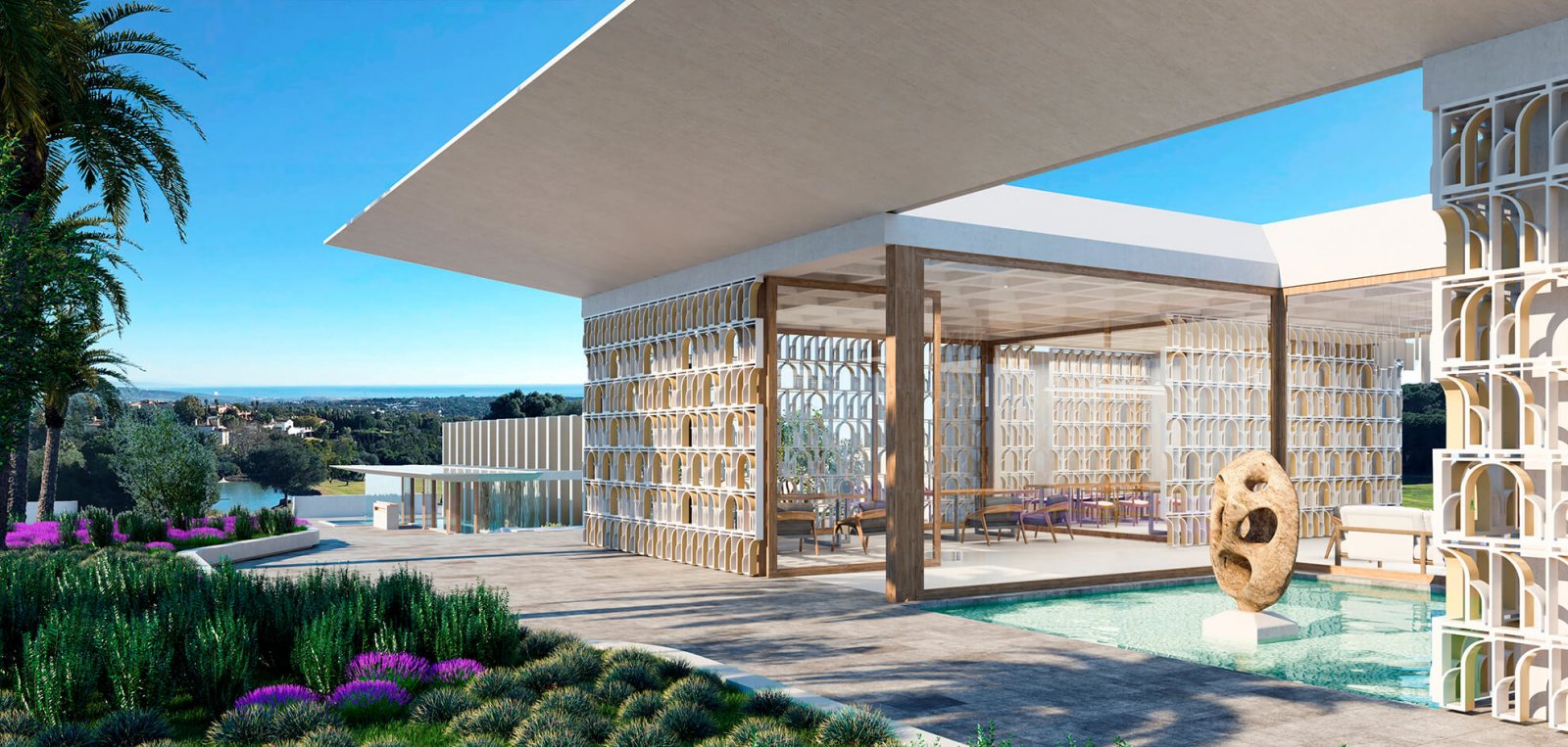 View of the garden with pool and interior facade of the Sotogrande