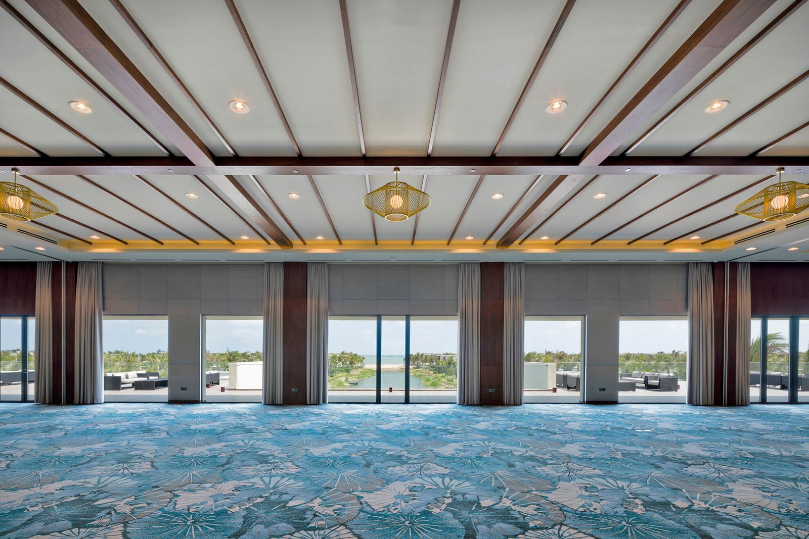 Reception room overlooking the pool and beach of the Melia Ho Tram